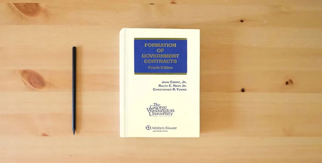 The book Formation of Government Contracts, 4th Edition} is on the table